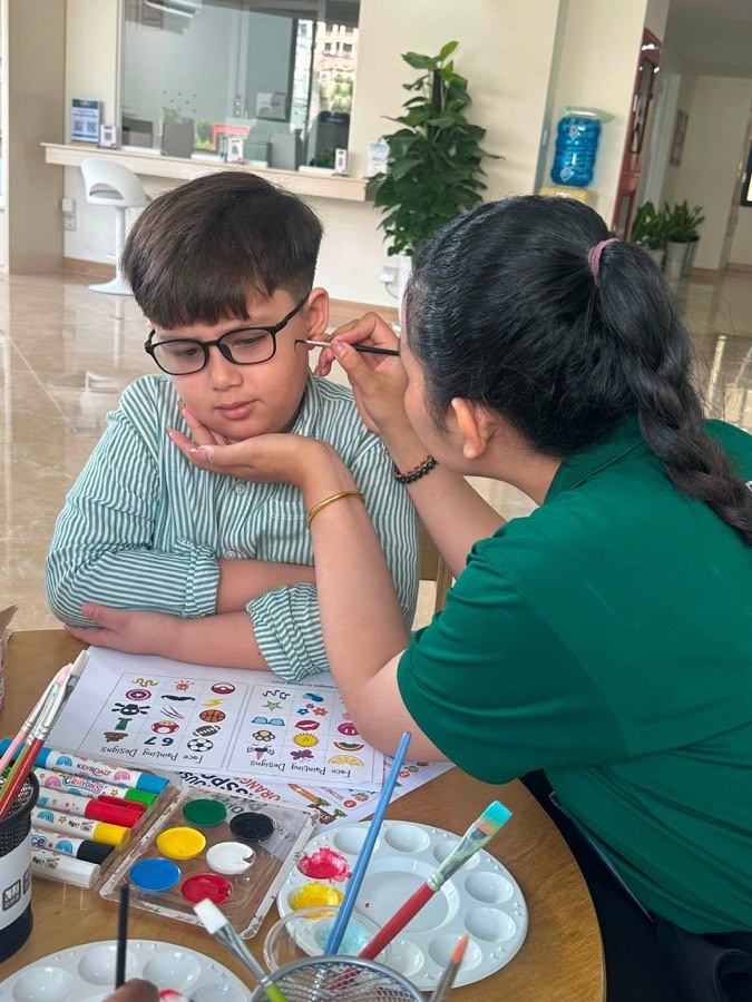 A face-painting activity at Norea